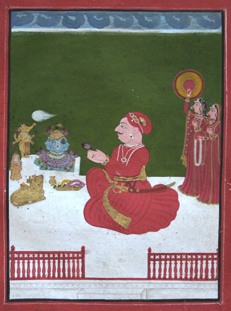 Seated raja in red on a terrace with idols. Indian miniature painting.
